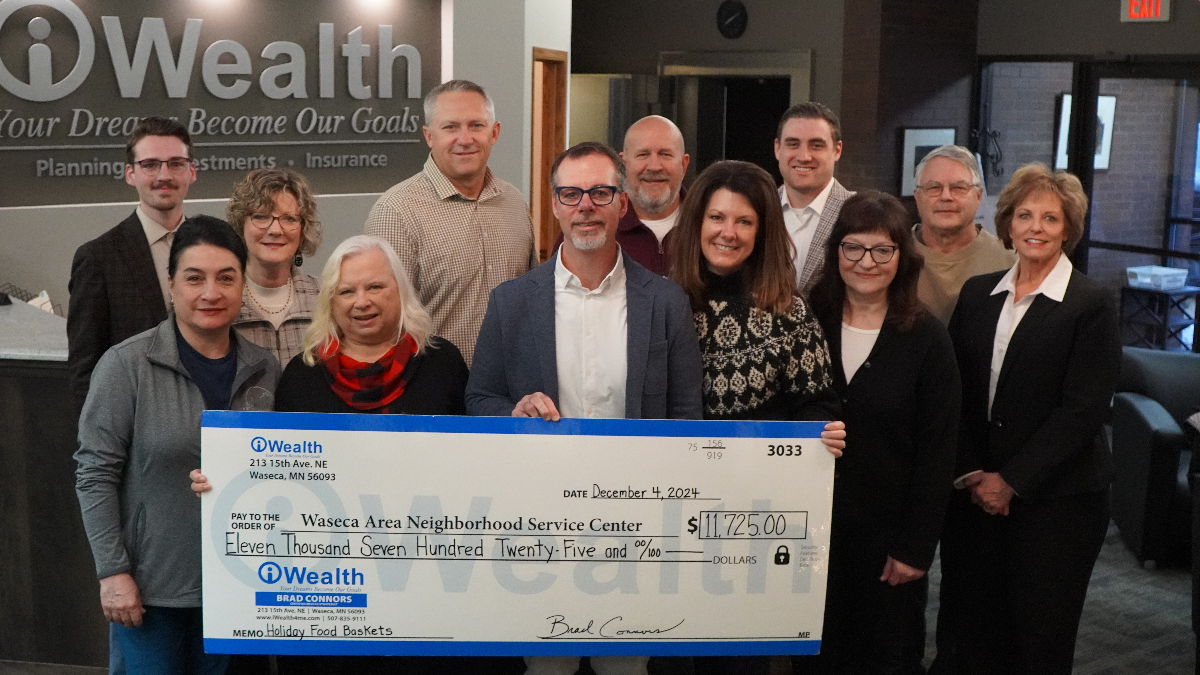 iWealth Presents the iWealth Holiday Food Basket Check to WANSC